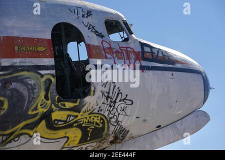 Abandoned airplanes covered in graffiti in the desert outside of Phoenix, Arizona. Stock Photo