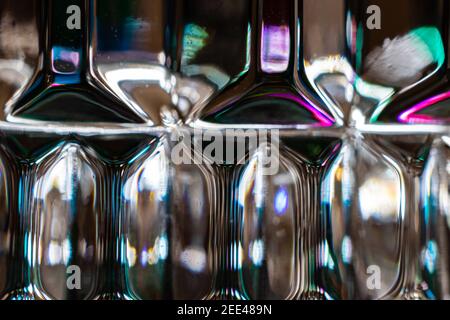 Getting very close to the refractions of light originating directly and from the candle holder Stock Photo