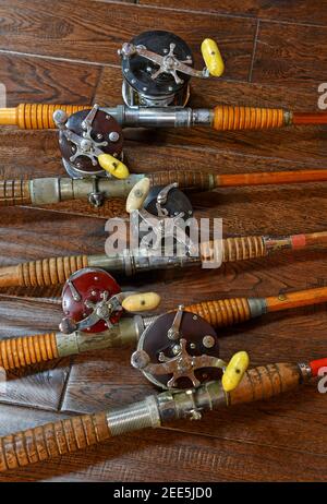 Vintage bamboo fishing rods and conventional reels Stock Photo - Alamy