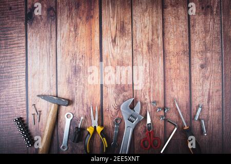 working tools on dark wood background with space for text Stock Photo