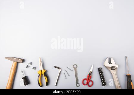 working tools on a light blue background Stock Photo