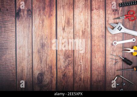 working tools on dark wood background with space for text Stock Photo