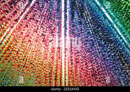 Colorful background, multi-colored origami hanging from ceiling. Stock Photo