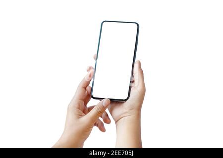 Both hands are working a smartphone with a modern design and a blank screen separately on a white background with the clipping path. Stock Photo