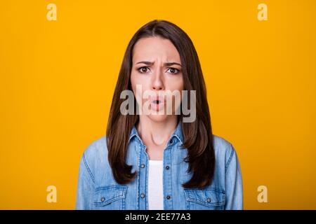 Portrait of astonished girl hear wonderful novelty cant believe wear good look clothes isolated over vibrant color background Stock Photo