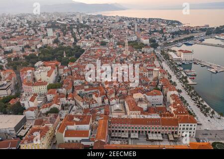 Aerial drone west side view of Diocletian Palace by riva in Split old town in Croatia in sunrise Stock Photo