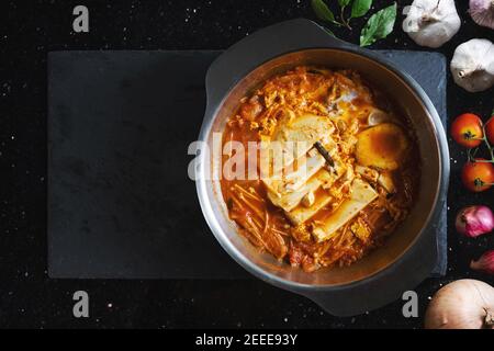 Traditional Korea food, Kimchi Jjigae soup. Top view Stock Photo