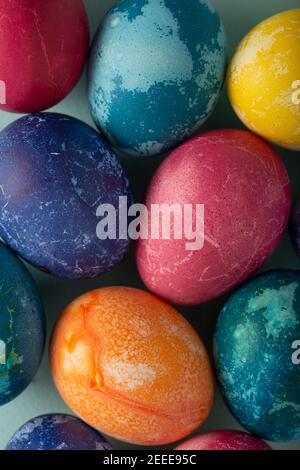 Multicolored Easter eggs on a blue background Stock Photo