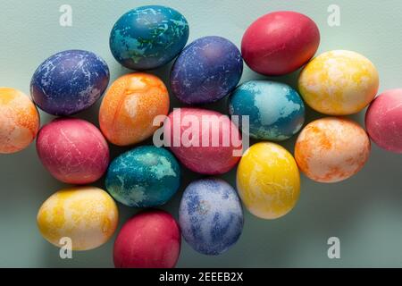 Multicolored Easter eggs on a blue background Stock Photo
