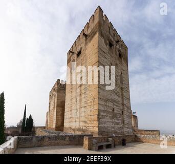 Granada, Spain - 5 February, 2021: massive stone guard towers in the Alcazaba fortress in the Alhambra in Granada Stock Photo