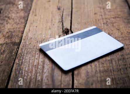Credit card on a wooden background Stock Photo