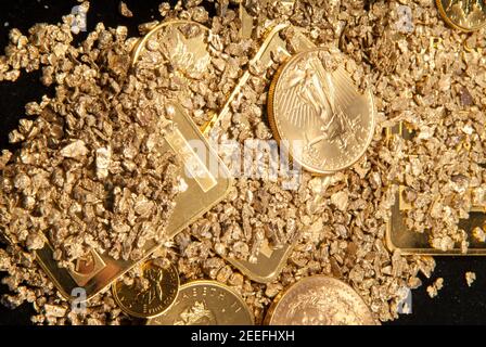 gold in coins, nuggets and ingots Stock Photo