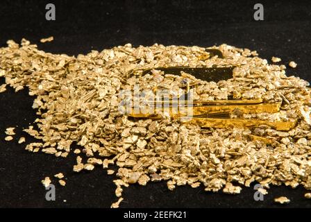 gold in coins, nuggets and ingots Stock Photo