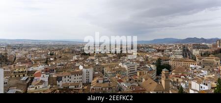 Granada, Spain - 4 February, 2021: panorama view of the rooftops and city of Granada in Andalusia Stock Photo