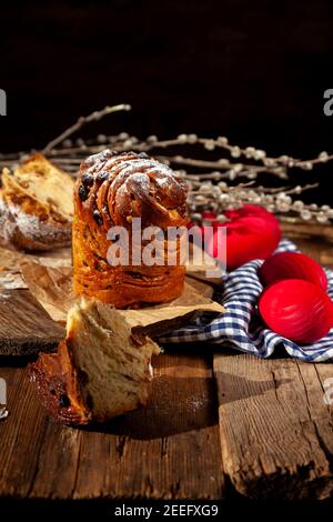 Easter cake kraffin. Kraffins with raisins, candied fruits and poppy seeds, sprinkled with powdered sugar. Close-up of homemade cake. Cruffin. Red Stock Photo