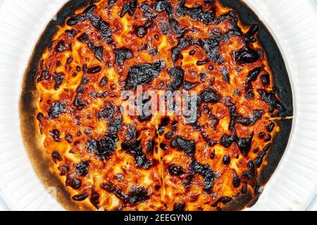 Burnt pizza Stock Photo