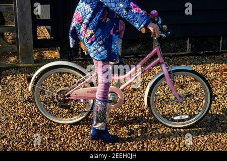 Child on bicycle Stock Photo