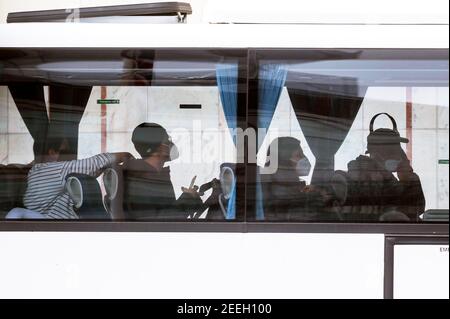 London, Britain. 15th Feb, 2021. Passengers from Heathrow Airport arrive at Radisson Blu Edwardian Hotel, a quarantine hotel in London, Britain, on Feb. 15, 2021. From Monday, all British and Irish citizens and British residents who arrive in England after being in the 'red list' of more than 30 high-risk countries now have to self-isolate in hotels. The 'red list' countries include South Africa, Portugal and South American nations. Credit: Ray Tang/Xinhua/Alamy Live News Stock Photo