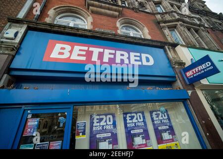 London- February, 2021: Betfred, a high street bookmaker gambling shop in Ealing Broadway Stock Photo