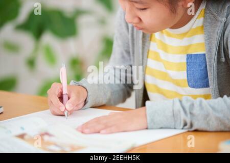 Japanese junior high schoolgirl studying remotely Stock Photo