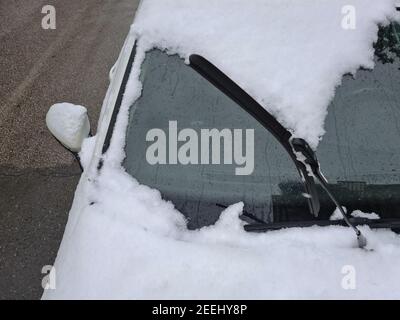 Car wiper raised above the windshield for maintenance Stock Photo - Alamy