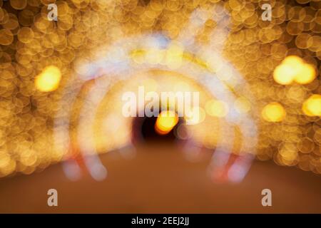 Blurred background of outdoors garland in christmas Stock Photo
