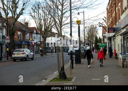 London-  Northfields high street, a long street of shops on residential area of Ealing West London Stock Photo