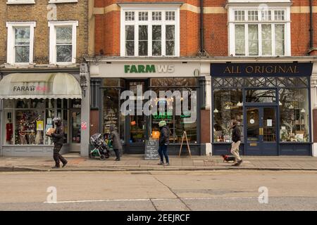 London- Small local independent shops on Ealing Green , Ealing Broadway in West London Stock Photo