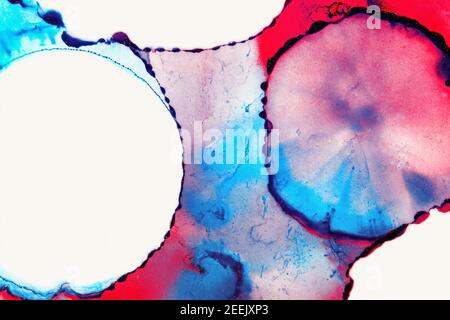 Beautiful abstract art background created with alcohol inks. Vibrant shades of pink, red and blue. Space for text. Stock Photo
