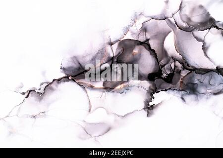 Abstract alcohol in background in smokey black, pink, and mauve tones. White background with space for text. Stock Photo