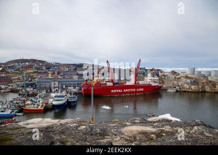 Container Ship in Ilulissat Harbor, Greenland Stock Photo