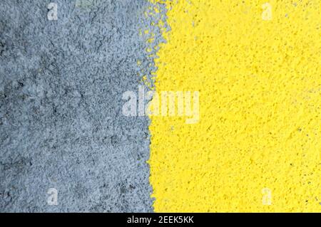 Yellow gray wall background. Abstract concrete textured wall background. Stock Photo