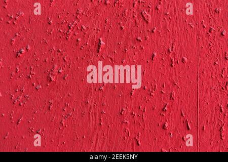 Red painted textured concrete cement wall background Stock Photo