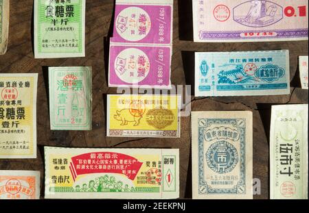 Variety of the coupons or ration tickets used in China for life necessities from 1953 to 1993. Stock Photo