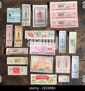 Variety of the coupons or ration tickets used in China for life necessities from 1953 to 1993. These are cloth and cotton tickets. (Private collection) Stock Photo
