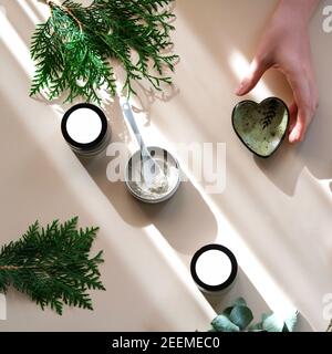 Beautiful delicate background of the process of making natural cosmetics from clay at home. Stock Photo