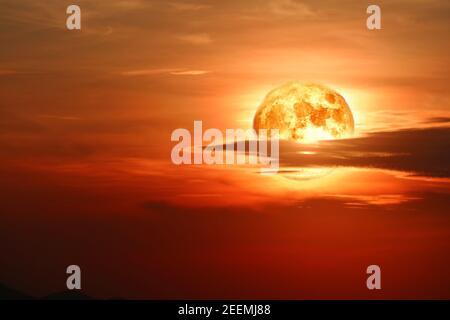 Super blood moon and silhouette coconut tree in the field and night sky ...
