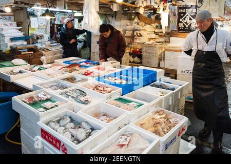 Tokyo, Japan - Jan 22 2016: fish vendors at Tsukiji Fish Market in Tokyo Stock Photo