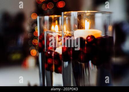 Floating Candles Floating in Hurricane Glass Vases Stock Photo