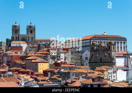 View across the terracotta rooftops of Porto, Portugal looking up to the cathedral Stock Photo