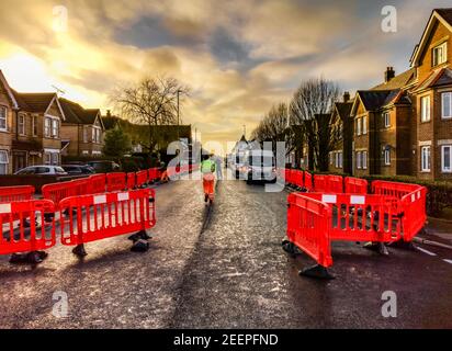 Poole, UK. 16th Feb, 2021. Bournemouth, UK. Tuesday 16 February 2021. Usually busy Ashley Road, connecting Bournemouth and Poole, is closed for resurfacing. Credit: Thomas Faull/Alamy Live News Stock Photo