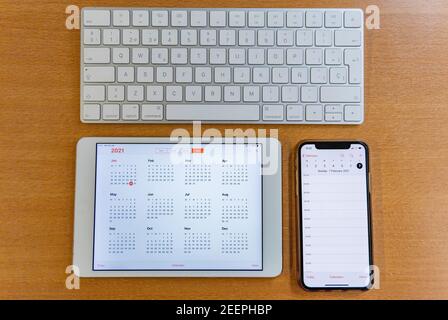 Electronic calendars and computers with open calendars Stock Photo