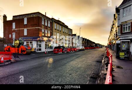 Poole, UK. 16th Feb, 2021. Bournemouth, UK. Tuesday 16 February 2021. Usually busy Ashley Road, connecting Bournemouth and Poole, is closed for resurfacing. Credit: Thomas Faull/Alamy Live News Stock Photo