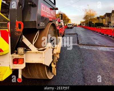 Poole, UK. 16th Feb, 2021. Bournemouth, UK. Tuesday 16 February 2021. Usually busy Ashley Road, connecting Bournemouth and Poole, is closed for resurfacing. Credit: Thomas Faull/Alamy Live News Stock Photo