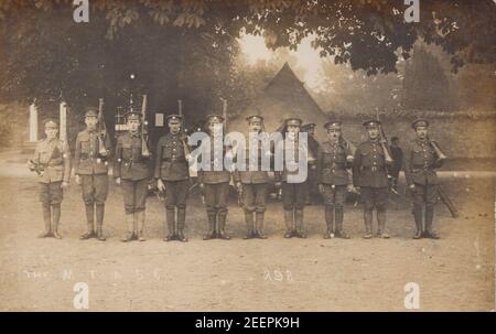 Vintage Photographic Postcard Showing a Group of British WW1 Soldiers. The M.T.A.S.C Guard at Witney, Oxford, Oxfordshire on the 21st September 1915. Stock Photo