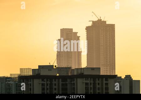 Tall skyscrapers under construction in the suburbs of Kandivali and Malad in the city of Mumbai. Stock Photo