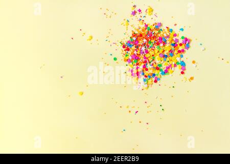 Bright confetti fireworks. Explosion of sweets. Festive card. Copy space Stock Photo