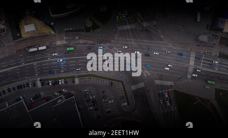 Smart self-driving autonomous cars in urban traffic - the concept of the Internet of Things. Artificial intelligence drives cars in urban traffic. Stock Photo