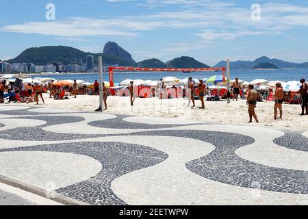 RIO DE JANEIRO - CIRCA JAN 2014:People on the Beach in Rio de Janeiro: January 2014 Stock Photo
