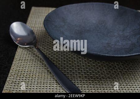 Beautiful empty black slate plate seen from above Stock Photo
